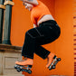 Orange Pro Boot rollerskate, jumping skater
