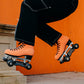 Orange Pro Boot rollerskate, jumping on skates