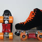 Chuffed Skates black roller skates with Brunny Hardcore sliding blocks