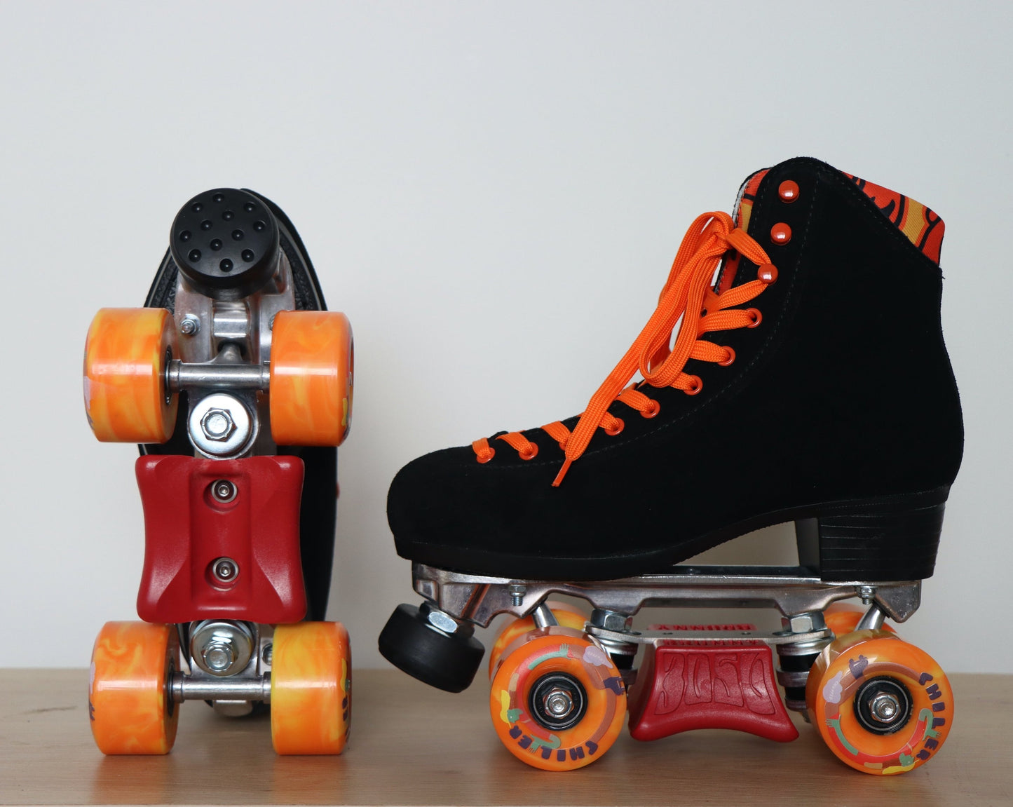 Chuffed Skates black roller skates with Brunny Hardcore sliding blocks